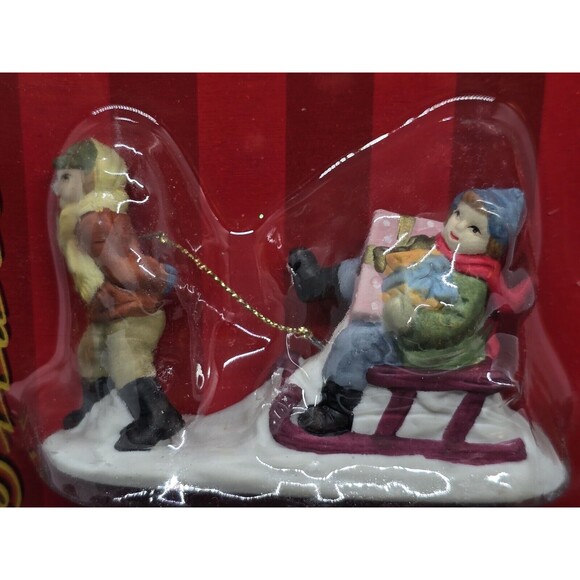 Vtg Caldor Share the Joy Village Accessorie Lady Pulling Boy On Sled With Gifts - Picture 2 of 5
